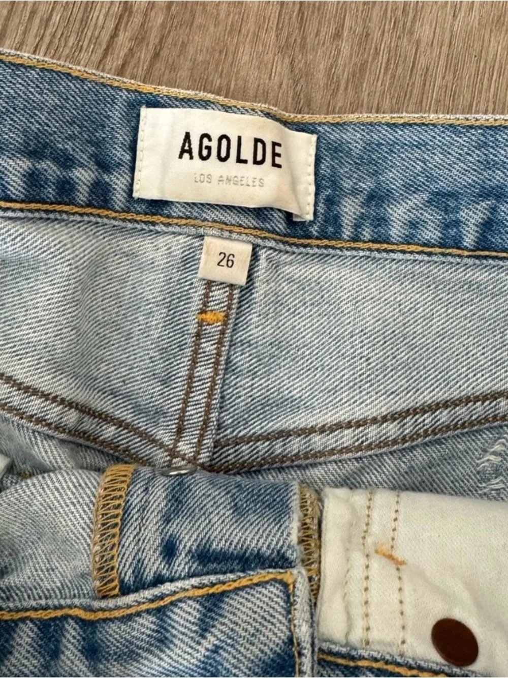 Agolde Washed Light Blue Distressed Cutoff Shorts